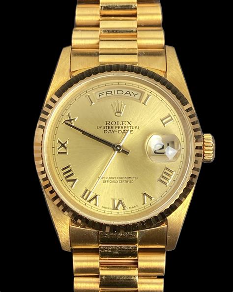 rolex oyster perpetual 18k gold.